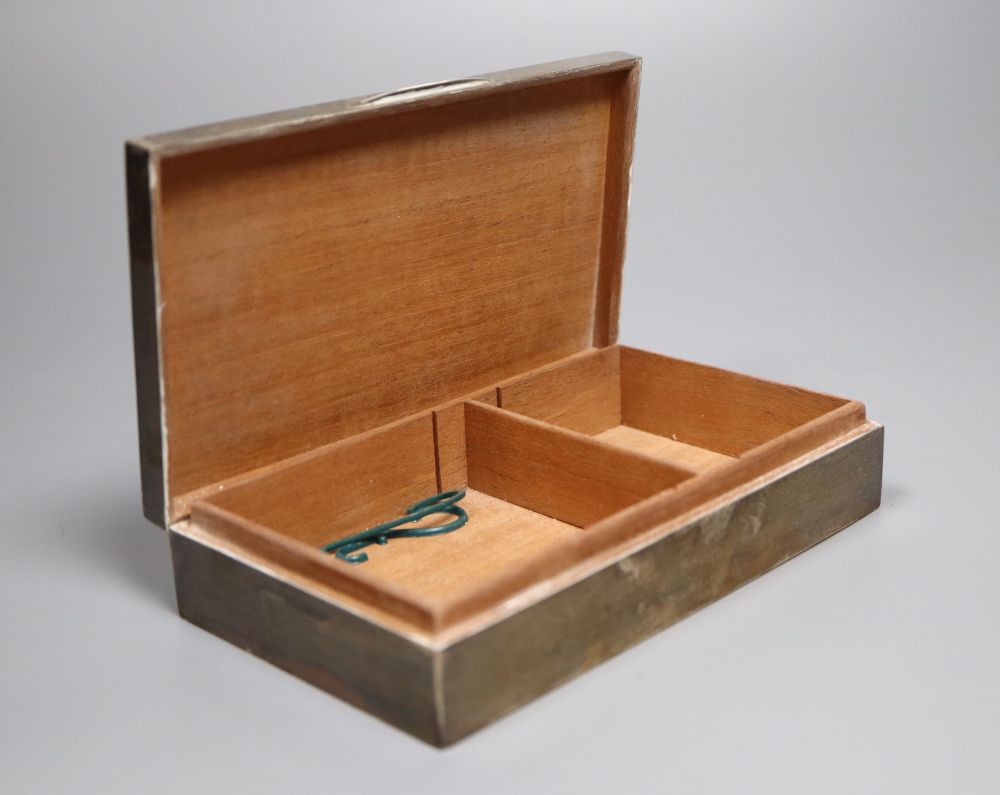 Two silver cigarette boxes, a silver cigarette case and Thai white metal cigarette box, largest 18.7cm.